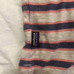 Mens Patagonia soft touch polo shirt. Tan blue peach striped colors.